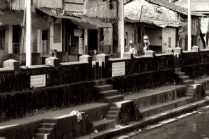 Women carrying water on top of their heads in Gokarn, India