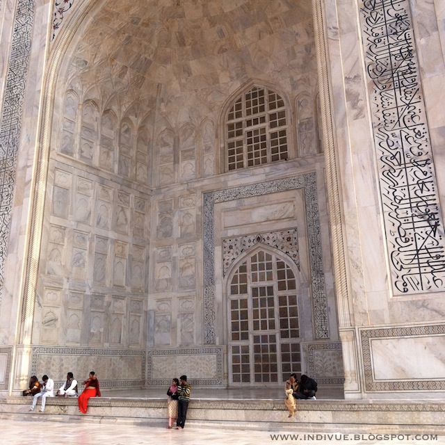 Tourists sitting in Taj Mahal