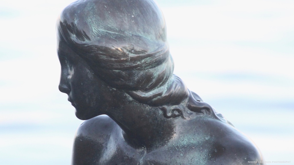Side pose of the Little Mermaid Statue in Copenhagen