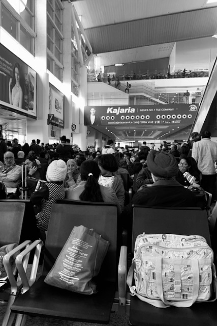 Delhi domestic airport passengers waiting