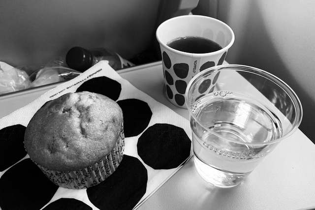 Tea and doughnut at Finnair flight from Delhi to Helsinki