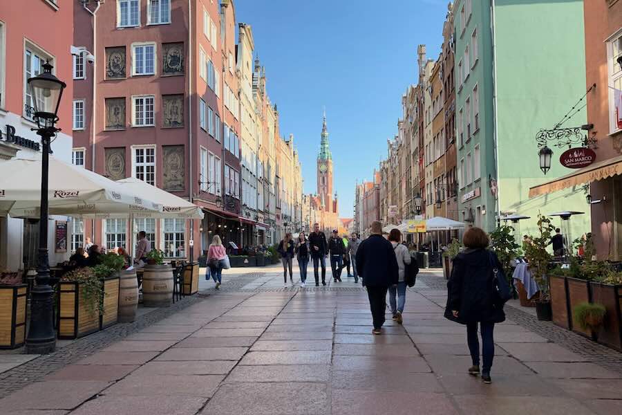People, tourists, walking on the street of Gdansk
