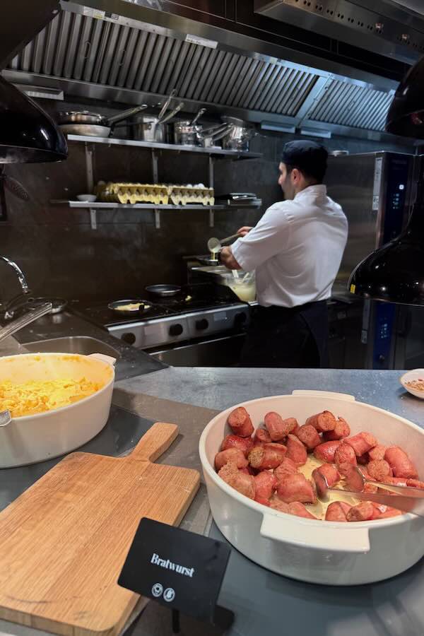 Chef preparing omelettes for hotel guests